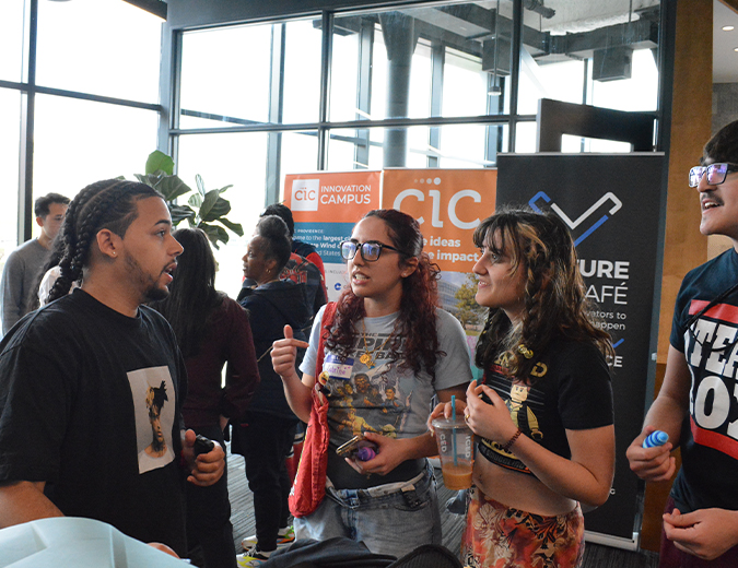 Students talking at an innovation event